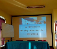 Powiększ zdjęcie Zdjęcie przedstawia ekran z nazwą olimpiady